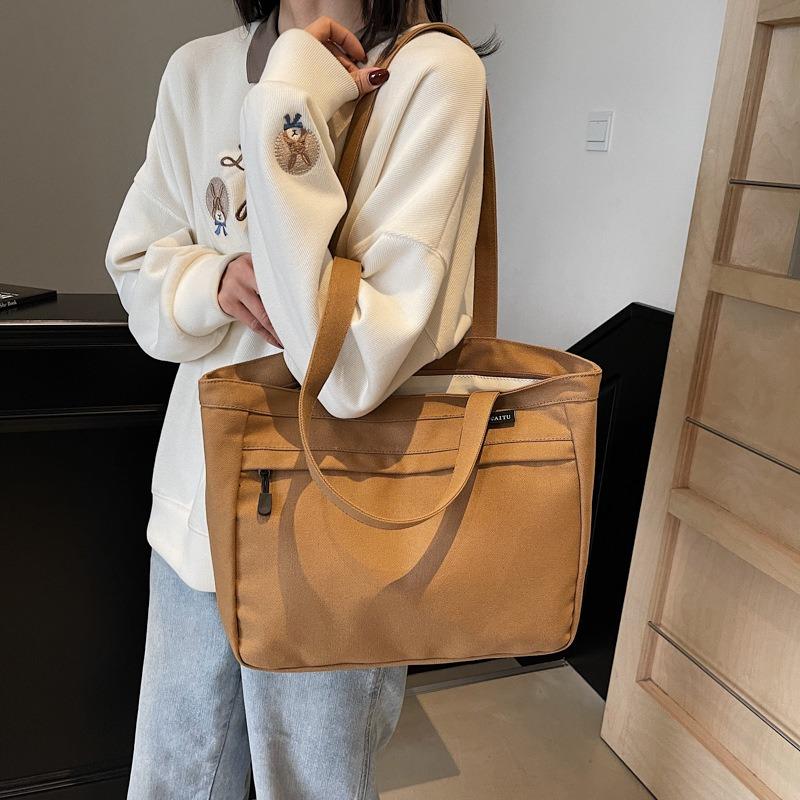 Casual large-capacity canvas bag women's new fashion versatile shoulder bag college student class bag