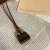 Colored artificial stone bag, wood beads, leather necklace, personalized creative design, sweater chain, Korean ins style necklace.