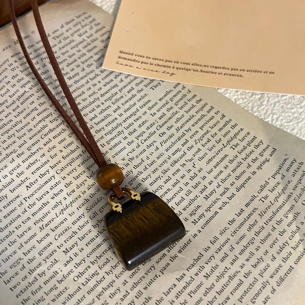Colored artificial stone bag, wood beads, leather necklace, personalized creative design, sweater chain, Korean ins style necklace.