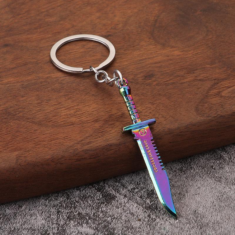 

Durable Metal Keychain with Intricate Design and Secure Split Ring Attachment for Everyday Use and Collection Purposes One Size рожевий