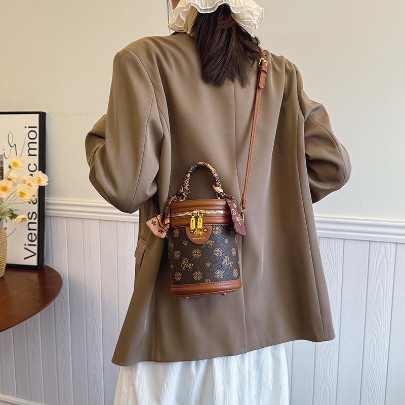 

Cylinder bag women s bag new trendy portable high-end bucket bag single shoulder crossbody old flower rice bucket small bag