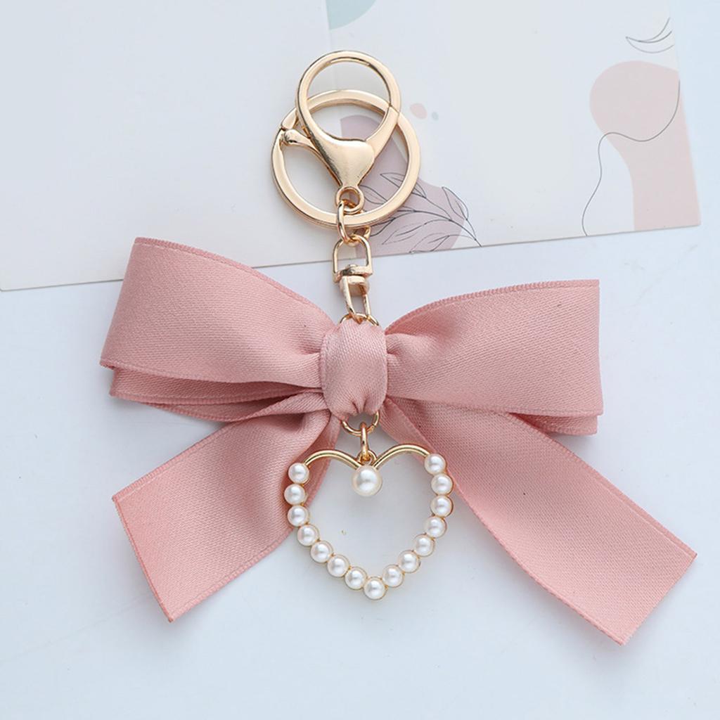 Fashionable Pearls Heart Shaped Pendant Keychain with Ribbon Bowknot Perfect For Young Girls Seeking Unique Accessories