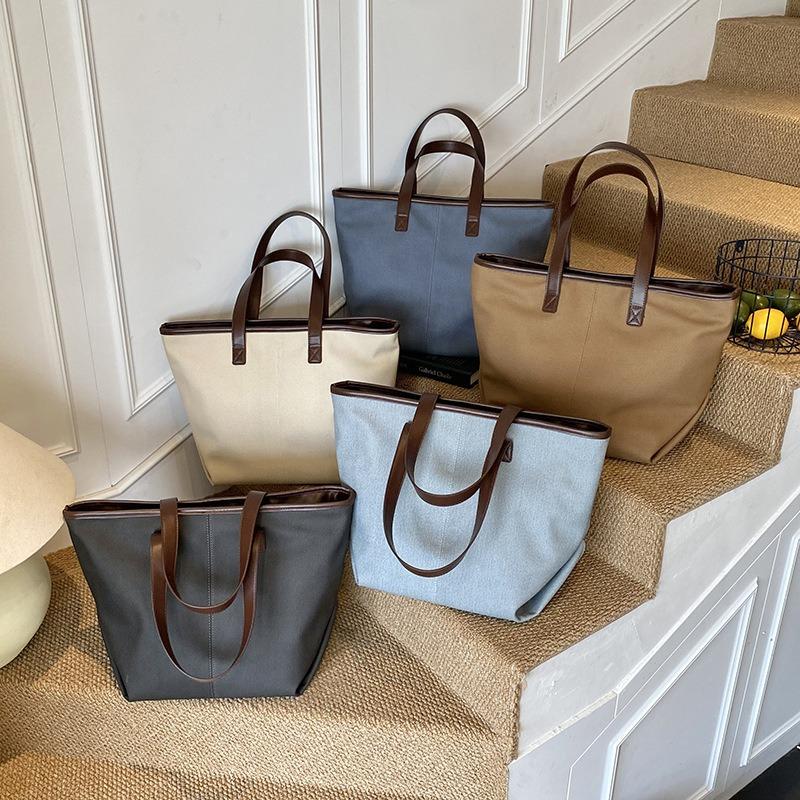 Stylish solid color simple bucket bag women's underarm bag new casual shoulder bag texture handbag