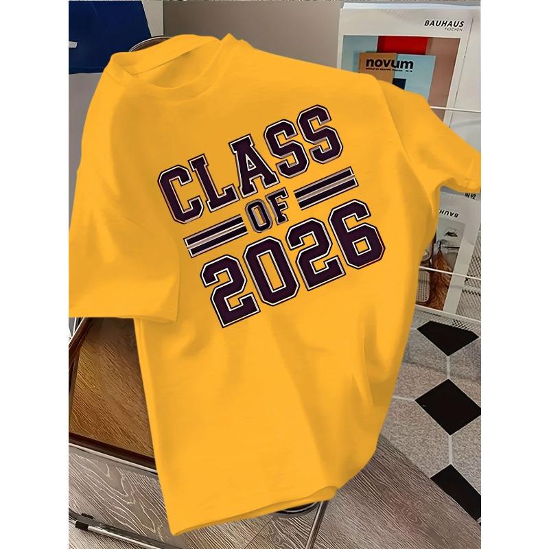 European sizes A Loose Short-Sleeve T-Shirt with The Text 'CLASS OF 2026' Displayed Against a Wooden Background, Perfect for Graduation Season