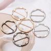 Broches en lichaamssieraden