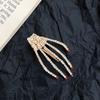 Rhinestone Skeleton Hand Hair Clip: Glittery Halloween Headpiece