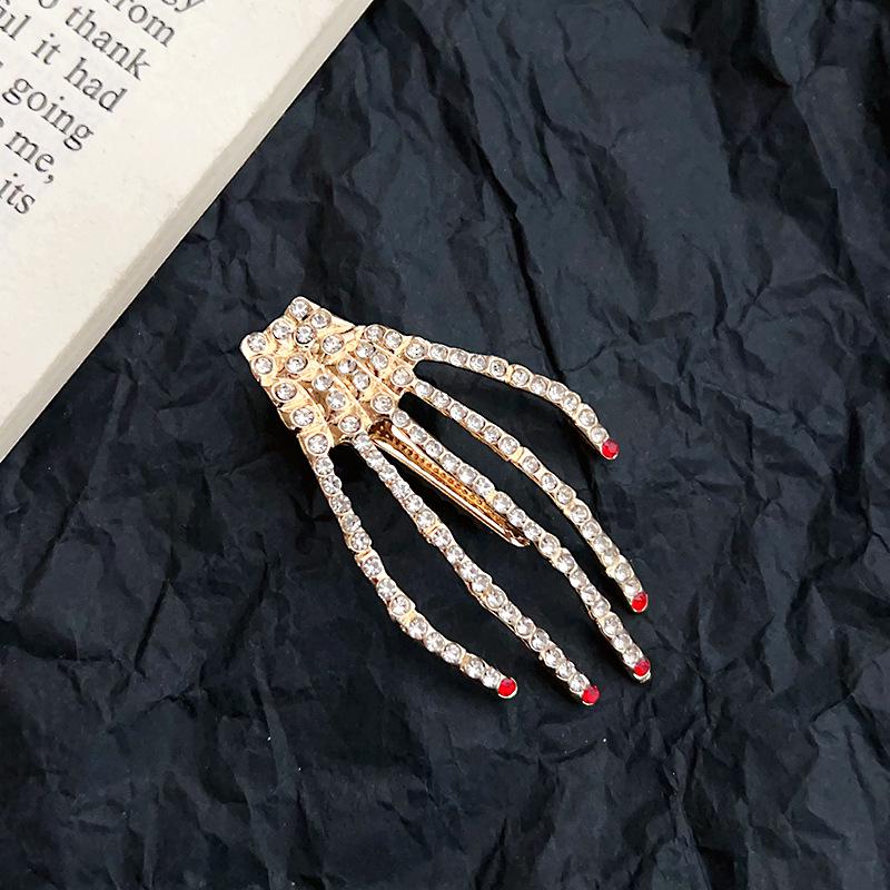 Rhinestone Skeleton Hand Hair Clip: Glittery Halloween Headpiece
