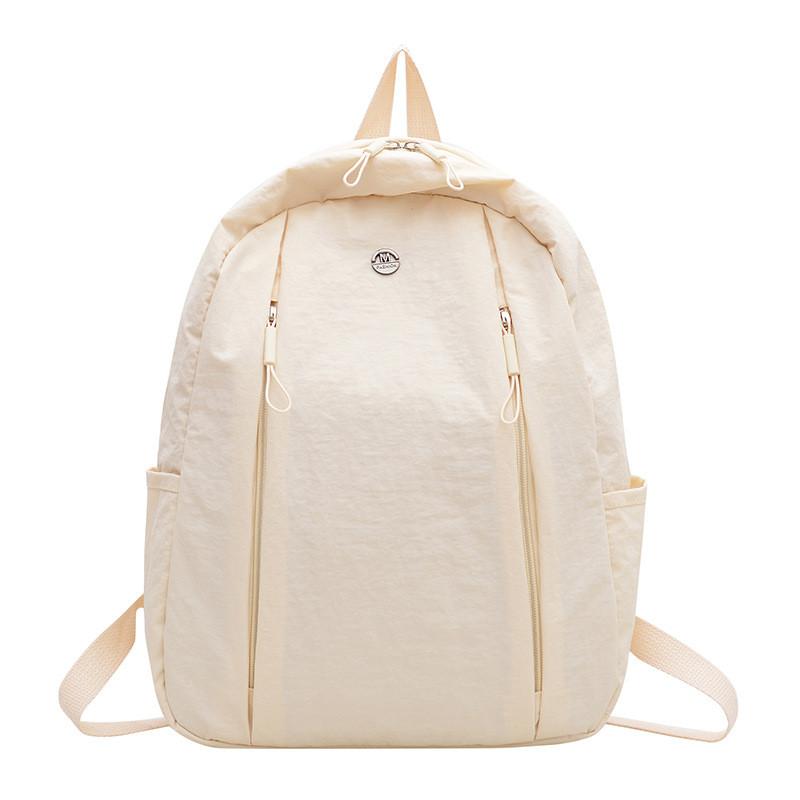 Lightweight Nylon Backpack For Commuting And Travel Withsmall Golden Roundel Decoration