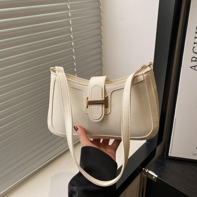 

Spring and summer new versatile temperament women s solid color high-end texture commuting armpit bag women s hand carry portable shoulder bag белый