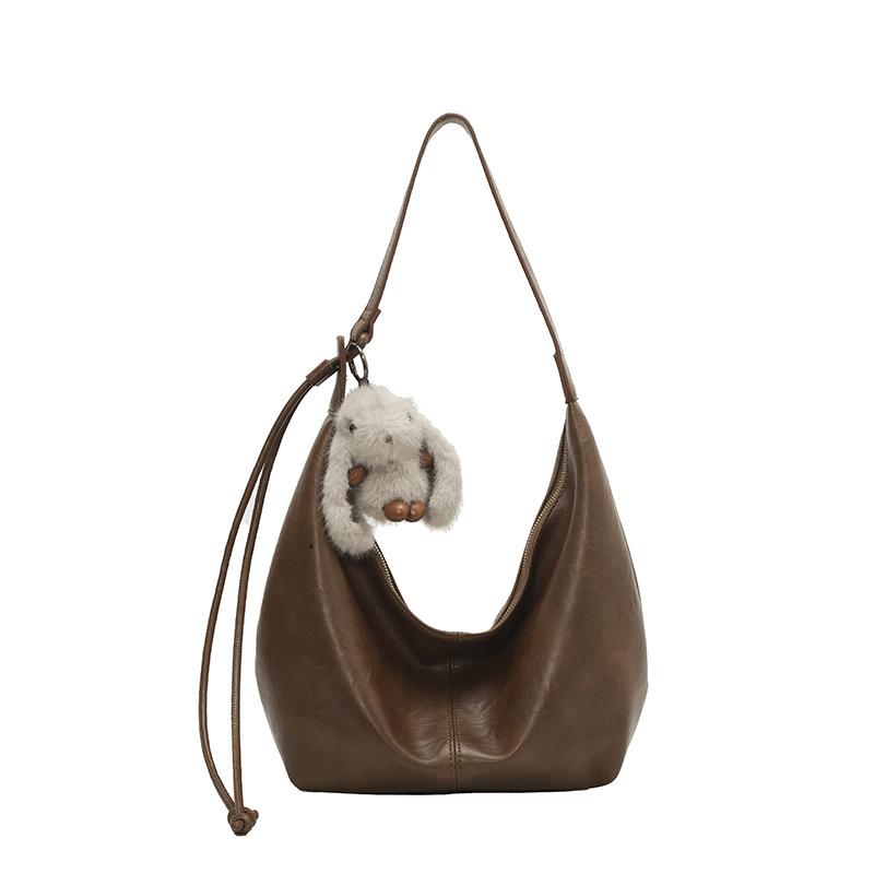 

2025 new high-end large-capacity bag women s Korean version fashion dumpling bag retro versatile shoulder messenger bag no pendant коричневый