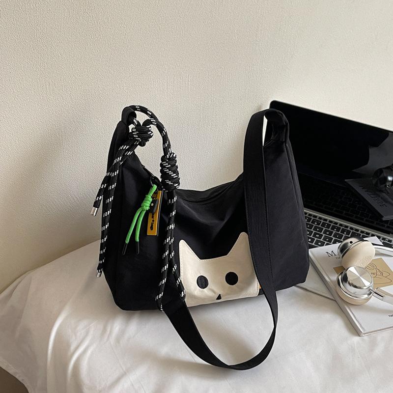 

New Japanese cute cat high-end tote bag women s leisure simple and light commuting fashion versatile messenger bag