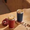Tazza da caffè portatile isolata in acciaio inossidabile
