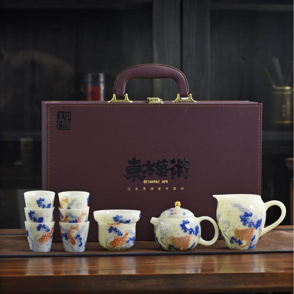 The whole set of jade tea set, household hoverable cover bowl set, gift box, kung fu tea set, business gift set, souvenir gift
