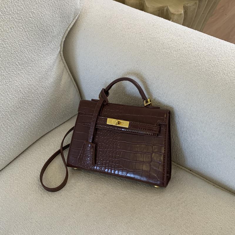 Hand-held small bag women's versatile 2025 new autumn and winter fashion texture cross-body small bag high-end shoulder bag