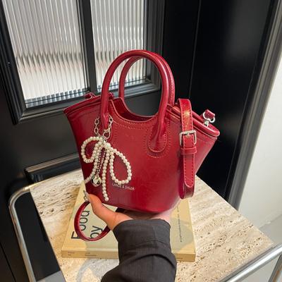 Sac à main Femme 2025 Nouvelle Mode Simple Sac Seau Design de Niche Sac Messager Polyvalent
