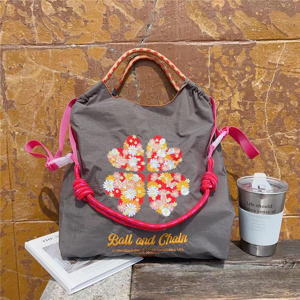 Japanese Four-Leaf Clover Embroidered Ball Chain Shoulder Bag - Trendy, Large-Capacity, Niche Commuter Style