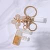 Chic White Tassel Letter Keychain with Resin Epoxy Pendant - Stylish Ornament for Bags