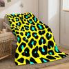 Black leopard spots with turquoise accents on a bright yellow background. for all seasons blanket lunch break throw gift