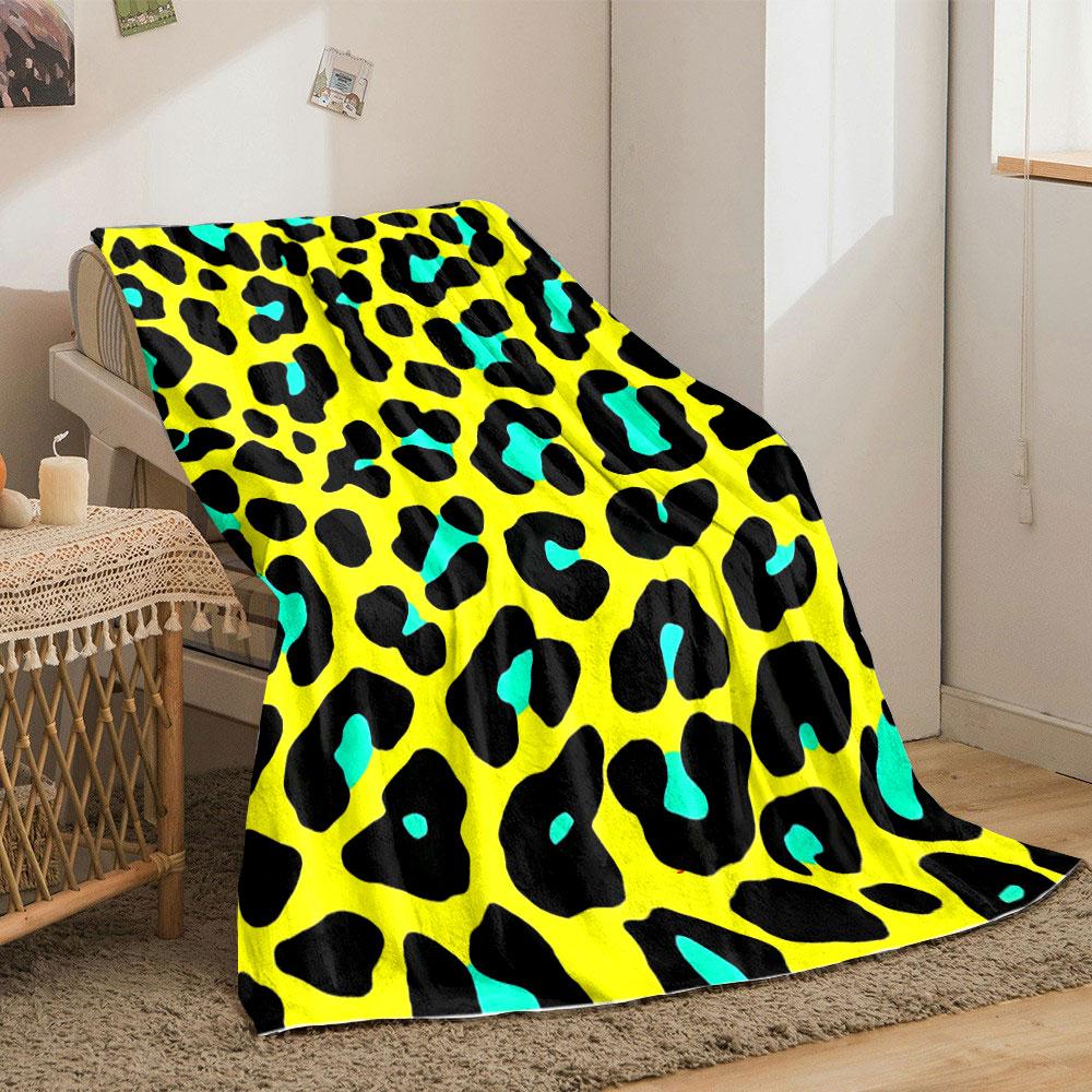 Black leopard spots with turquoise accents on a bright yellow background. for all seasons blanket lunch break throw gift