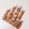 European and American new dripping butterfly imitation gemstone and diamond ring set Geometric twist ring seven-piece set