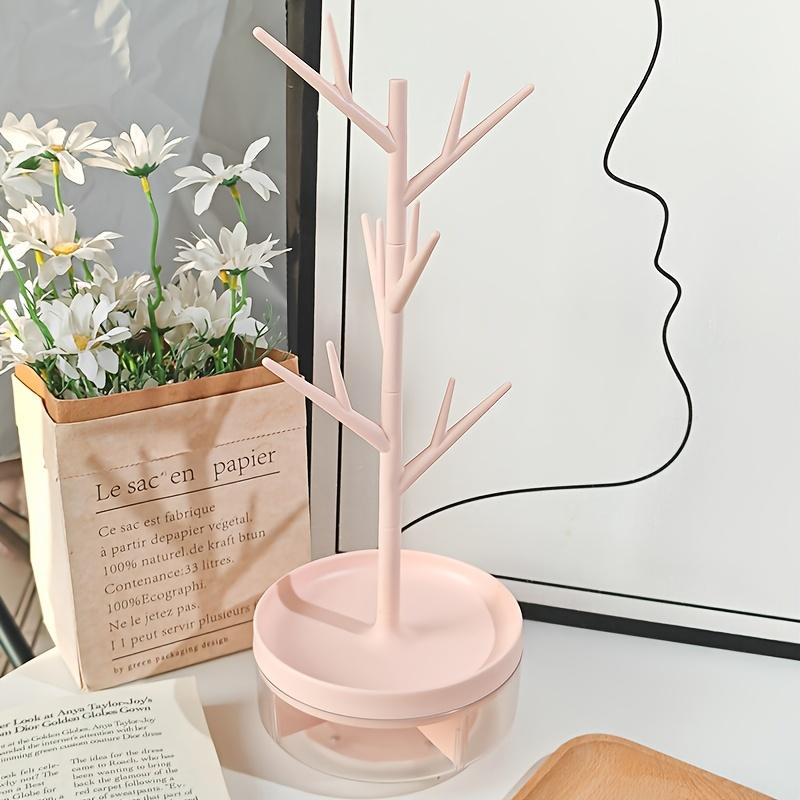 

Вращающийся на 360 градусов органайзер для украшений - Подставка для демонстрации ожерелий и серег с коробкой для хранения для туалетного столика и столешницы в ванной розовый