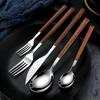 Islandqi Stainless Steel Cutlery Set: Korean-Style Wood Grain Handle Knife, Fork, and Spoon for Creative Dining.