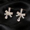 Elegant Zircon Bow Water Drop Stud Earrings - Light Luxury Niche Design for Women