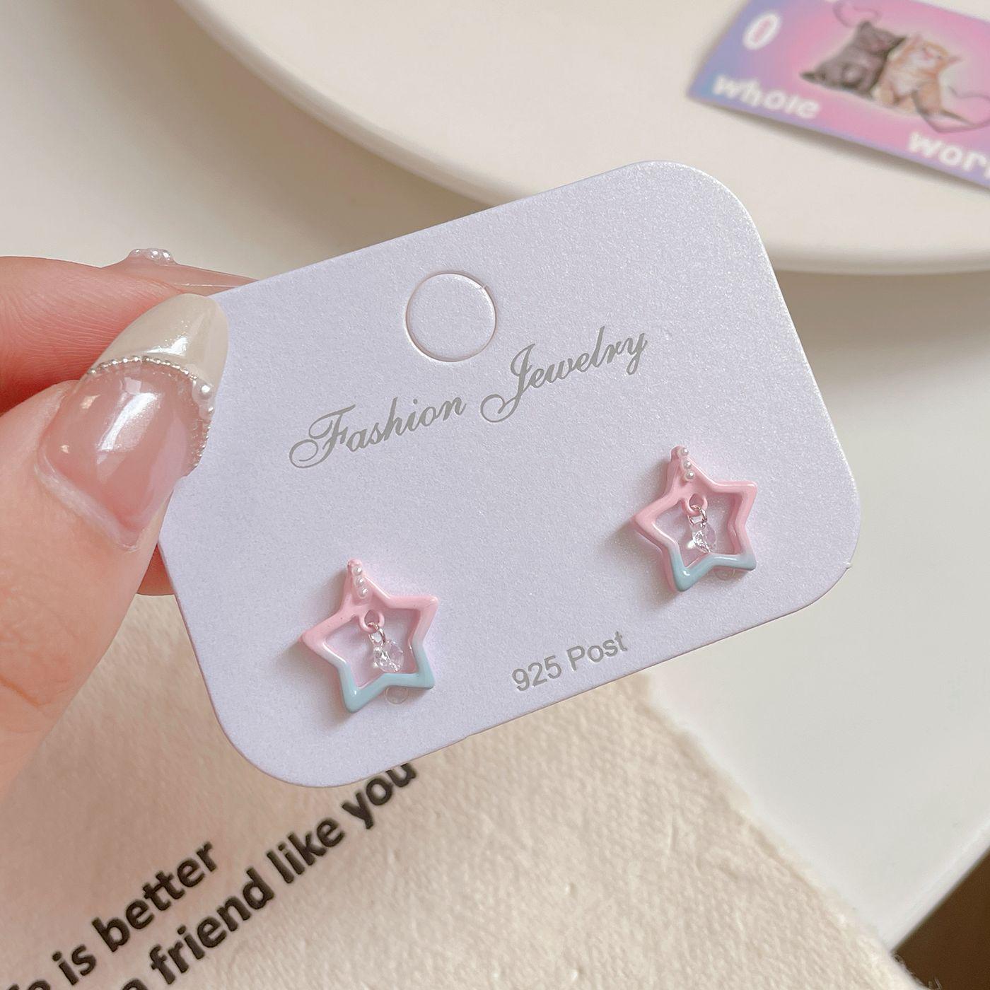 

Серьги-звездочки с градиентным цирконием – свежий, полый дизайн в серебре для женщин