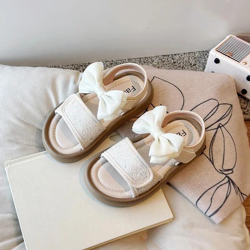 

Girls Sandals Princess Style Kids Beach Shoes Non-slip Soft Sole 2025 Summer New Children Flat Shoes Big Bow Shiny Sequins Cute 23 бежевый