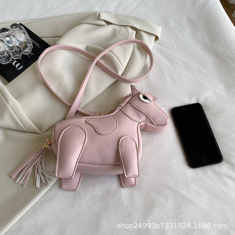 Personalized small bag new 2025 Japanese soft girl cartoon doll doll ugly cute one-shoulder tassel net red crossbody bag