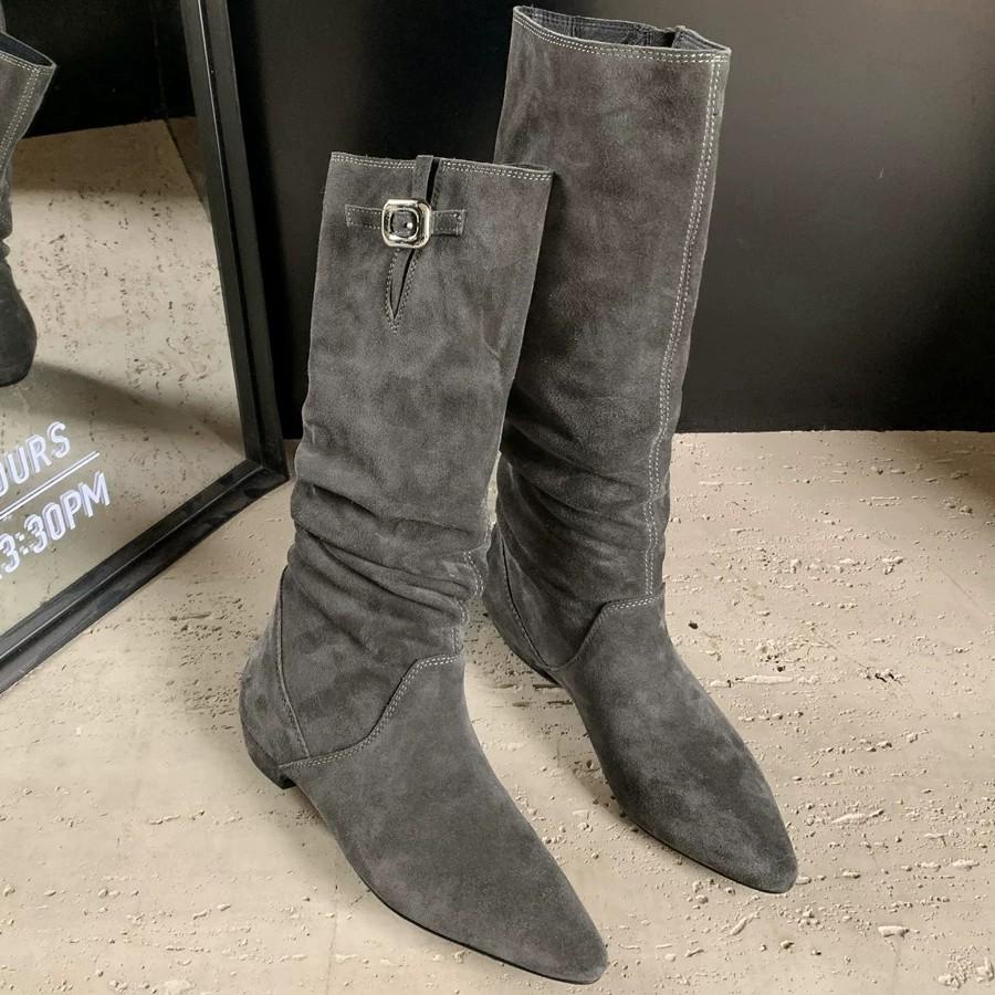 Autumn and winter new temperament versatile flat boots fashionable round head metal buckle sleeve solid color high boots