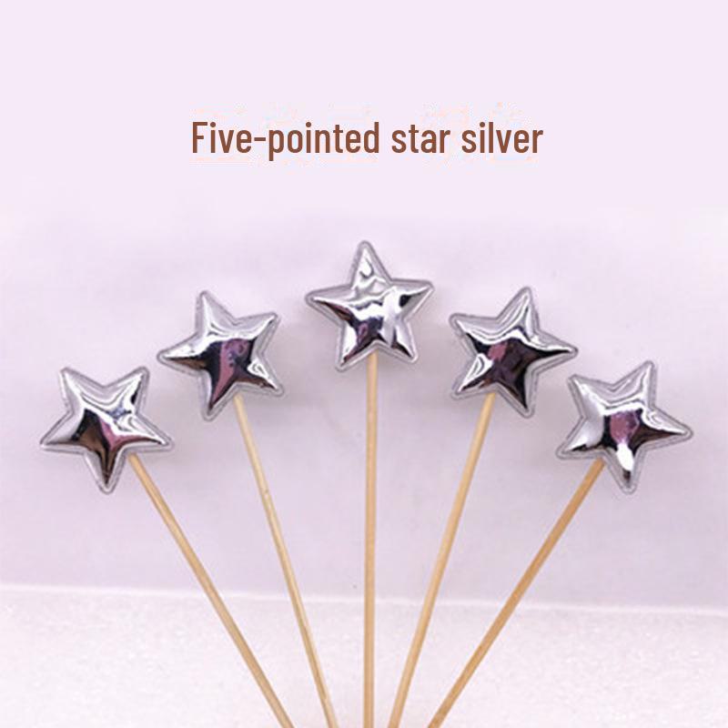 

Набор для украшения десерта из 5 предметов: Вставки в виде звезд, корон, сердец и мультяшных флагов stars 5 pieces серебряный