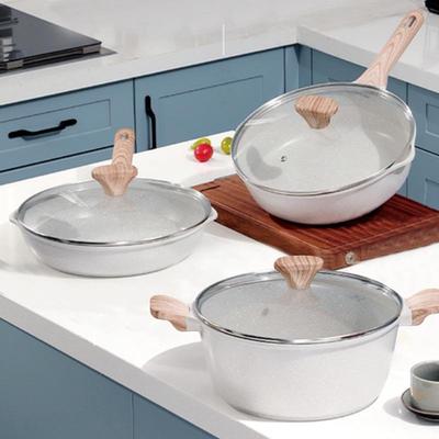 Elegantes antihaftbeschichtetes Kochgeschirr-Set aus medizinischem Stein: Rauchfreie Bratpfanne, Suppentopf, Milchtopf und Universal-Herdpfanne.