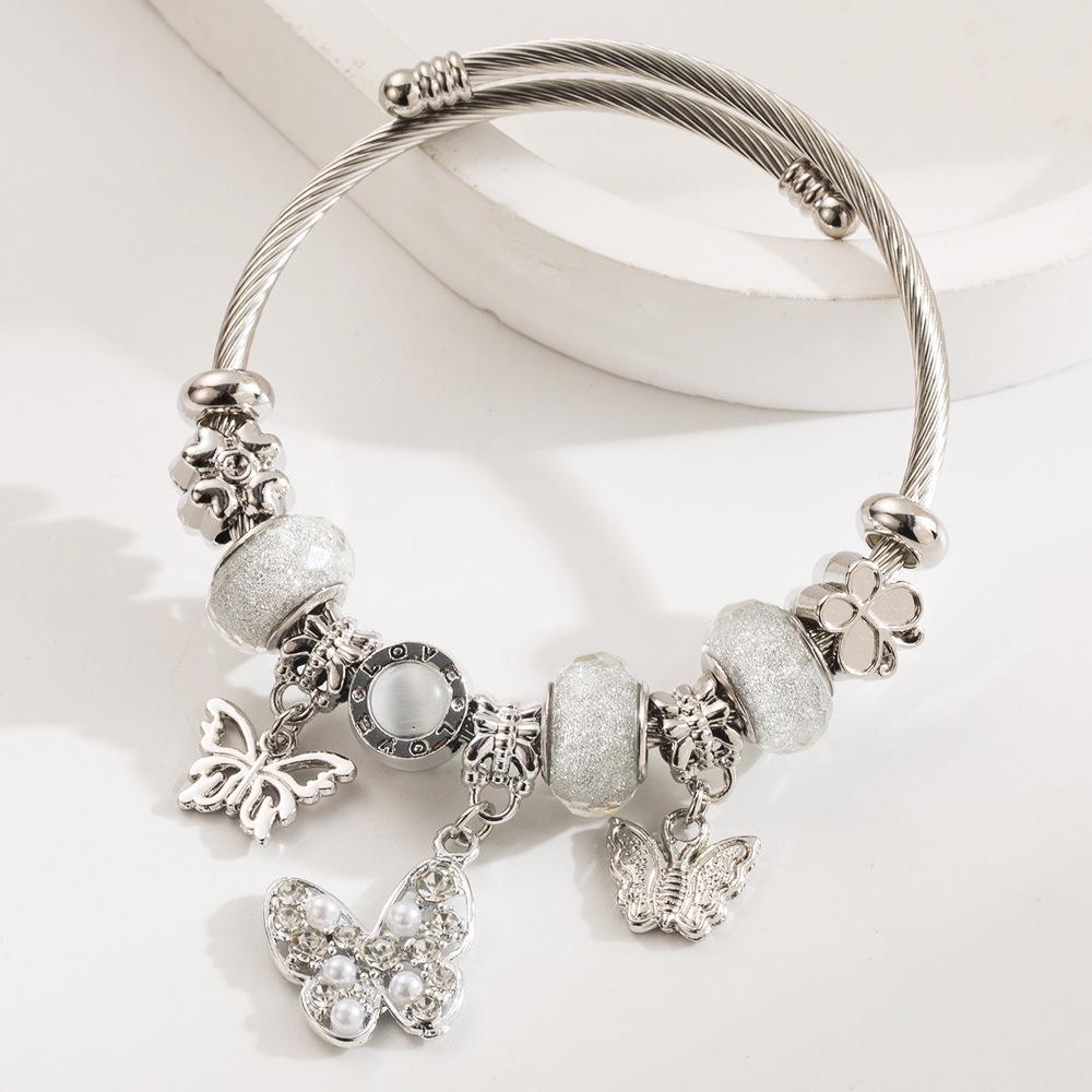 Panjia Dora Stainless Steel Bracelet: Women's Adjustable Bracelet with Diamond Beads & Love Pendant.