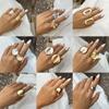 Exaggerated French Round Disc Pleated Metal Ring with Irregular Floral Design