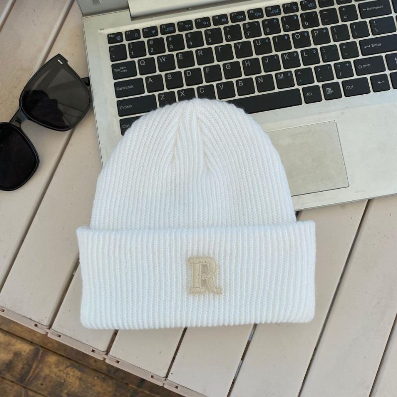 Hat winter female high-value round face student versatile cold-proof warm face small knitted wool hat