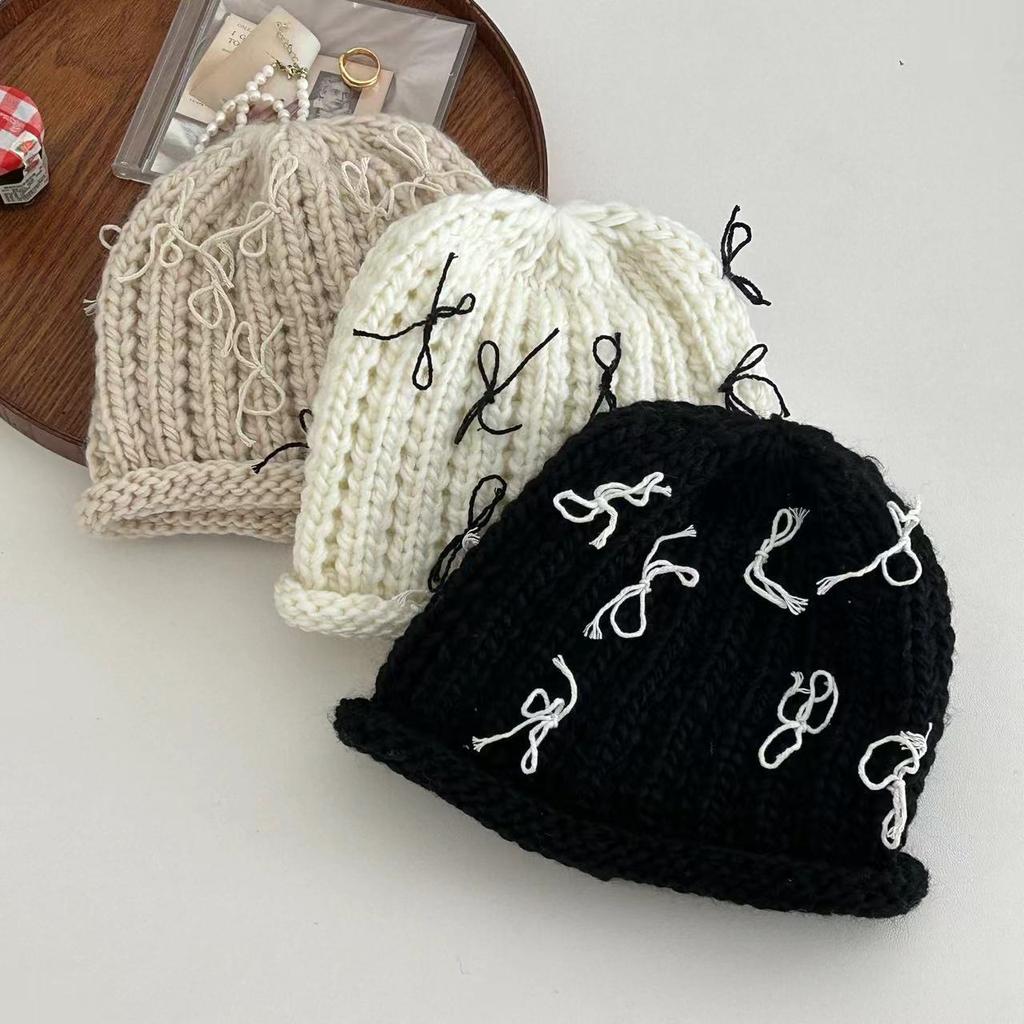 Autumn and winter crimped bow knitted bag head fashionable cold hat women's trendy new wool hat warm and sweet