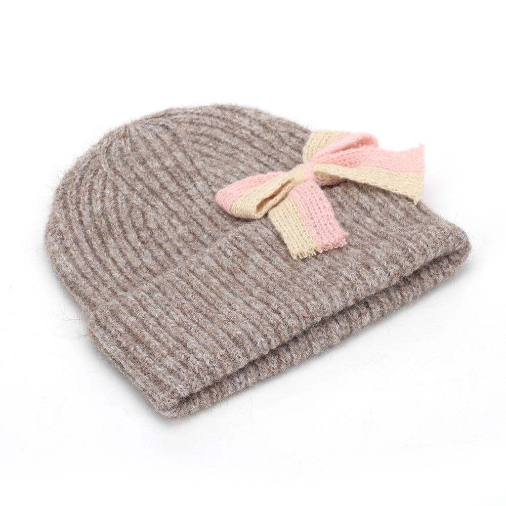 A Douyin hot-selling cute bow warm knitted hat wool hat women's flanged fashion windproof hat