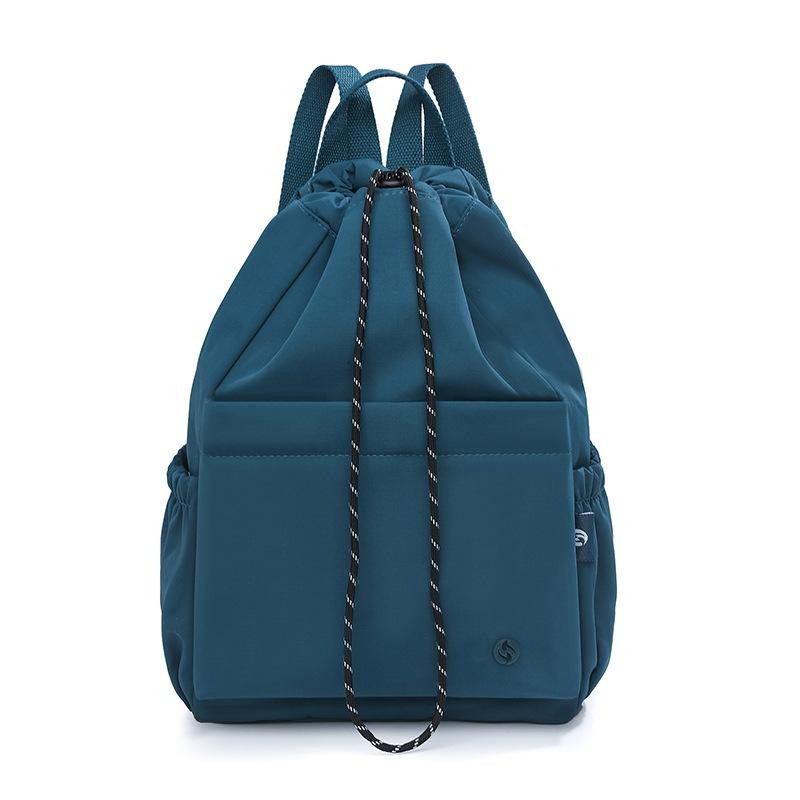 Schoolbag versatile backpack large-capacity design sense commuting travel large-capacity schoolbag waterproof and wear-resistant backpack wholesale