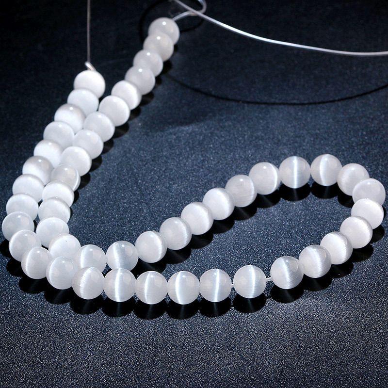 Białe kocie oko okrągłe koraliki do DIY biżuterii i akcesoriów