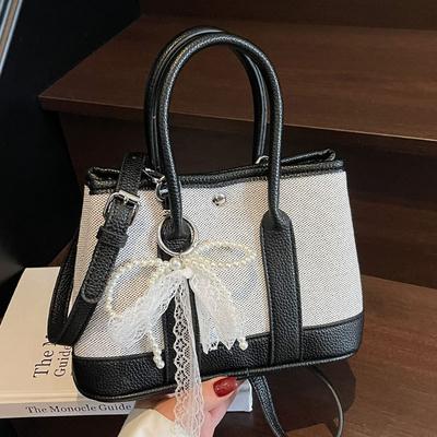 Sac seau portable couleur contrastée niche décontractée version coréenne vente en gros sac messager polyvalent simple personnalité pour femmes