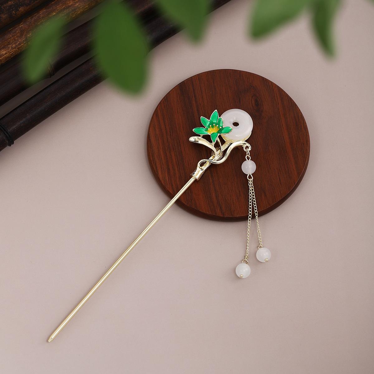 

Новый китайский стиль Этнический стиль Ретро Пряжка Пиан Ань Ципао Украшения для волос Капающая эмаль Цветы Бабочка Кисточка Шаг Дрожащий Древний стиль Заколка для волос