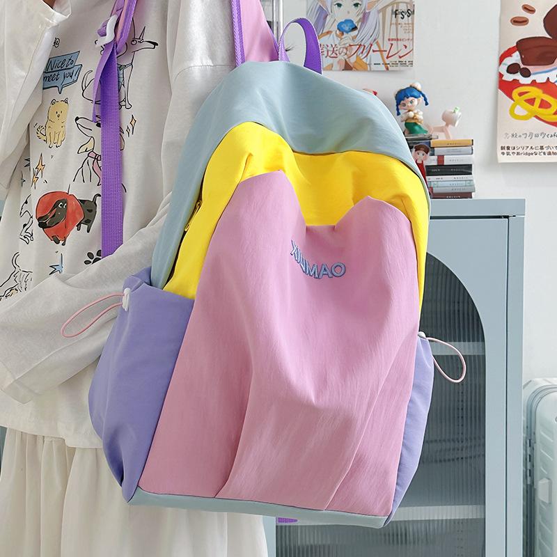 Casual backpack junior high school female student schoolbag ins large capacity couple travel backpack high value contrasting color backpack