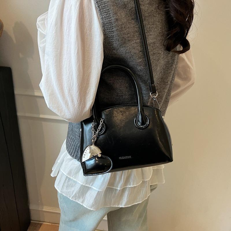 Niche Fashion Hand-carried Shell Bag Women's New Versatile Shoulder Bag Simple Casual Messenger Bag