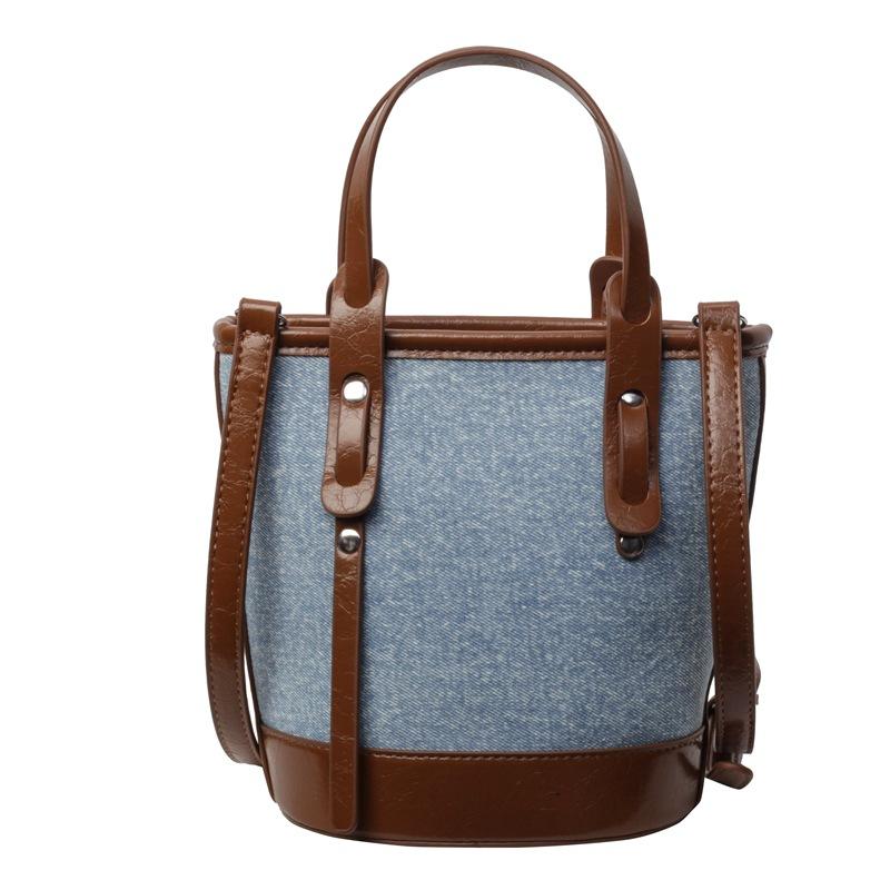 Popular contrasting color bucket bag women's new small bag fashionable portable shoulder bag textured messenger bag