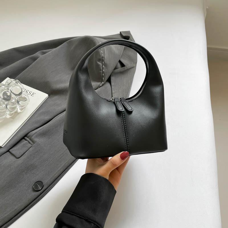 New Women's 2025 Niche Bag Solid Color Design High Sense Elegant Fresh Fashion Retro Versatile Handbag