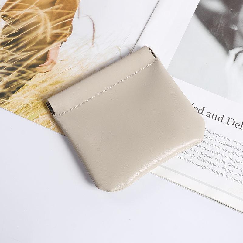 Automatic Cosmetic Storage Pouch with Spring Clip for Cables, Earphones, and Lipstick