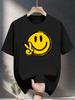 Unisex kurzärmeliges T-Shirt mit Happy Face Aufdruck Schwarz und Gelb Lässiges Sommeroberteil Normale Passform Rundhalsausschnitt