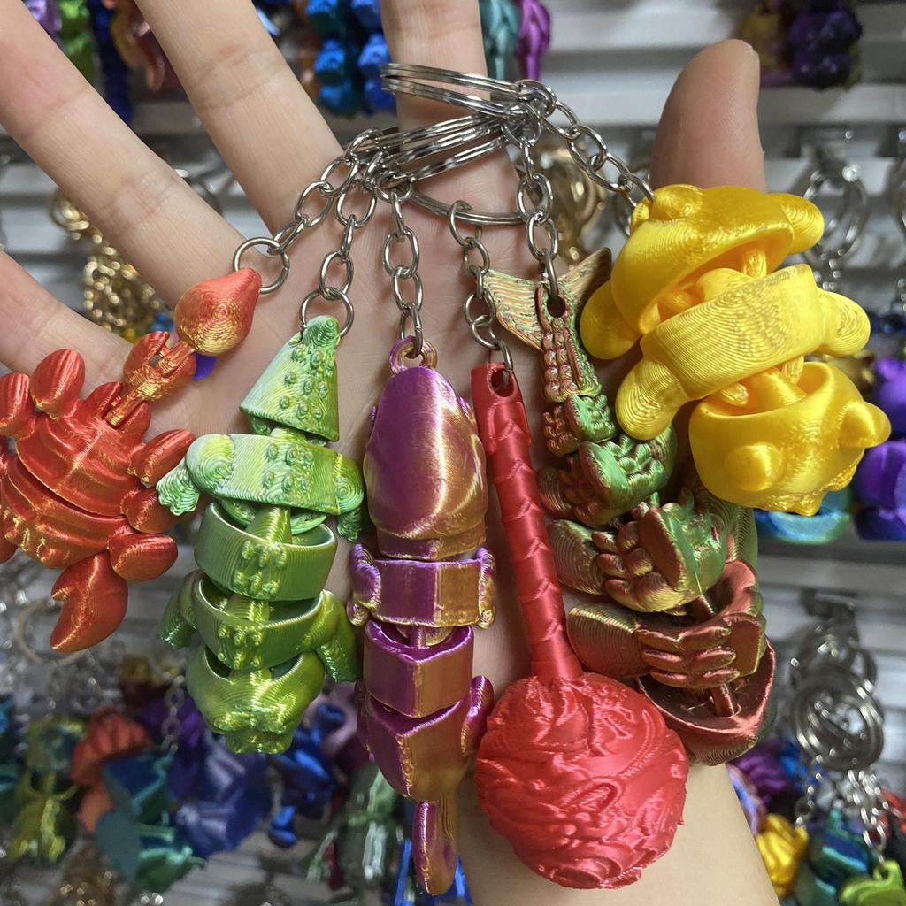 Gemischter Stil 3D-gedruckte Schlüsselanhänger: Zufällige Kinderspielzeuge & Sammlerstücke von Internet-Berühmtheiten für Nachtmärkte oder Geschenkläden