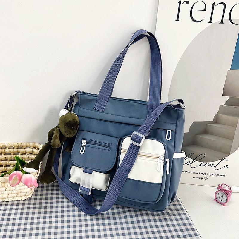 Large capacity bag female messenger ins wind Japanese college students class shoulder bag versatile literary tote bag